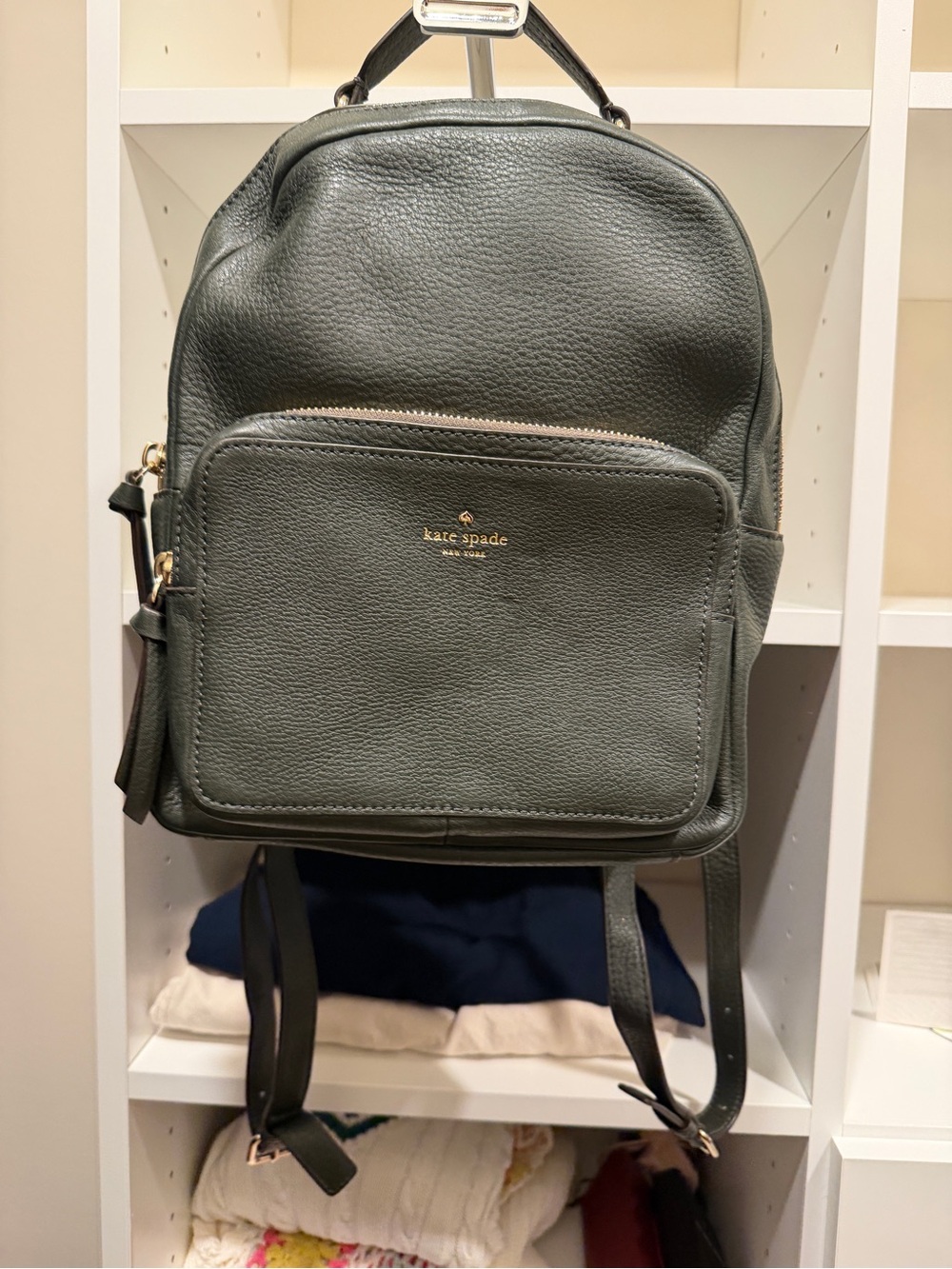 kate spade dark green pebbled leather backpack with front pocket